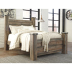 Trinell Poster Bed - Brown