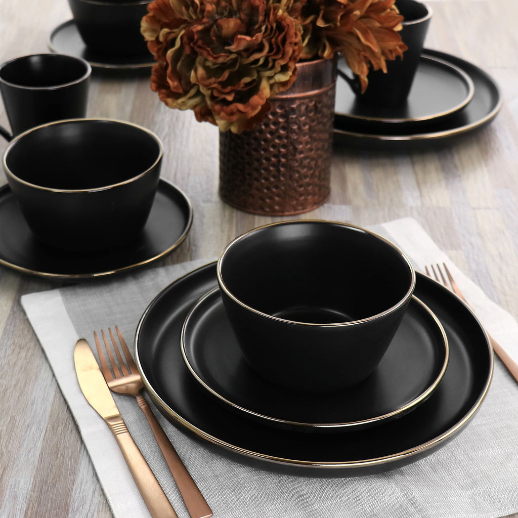 Stoneware Dinnerware 16 Piece Set in Black with Gold Rim